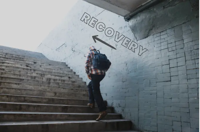 man walking up steps towards life after addiction