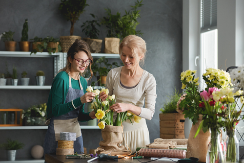 two women gardening together